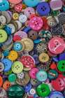 Close-up of variety of colorful buttons. Art Print